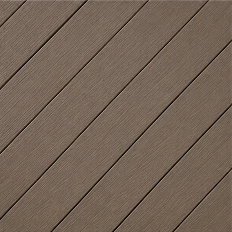 Close-up of taupe composite deck boards laid diagonally